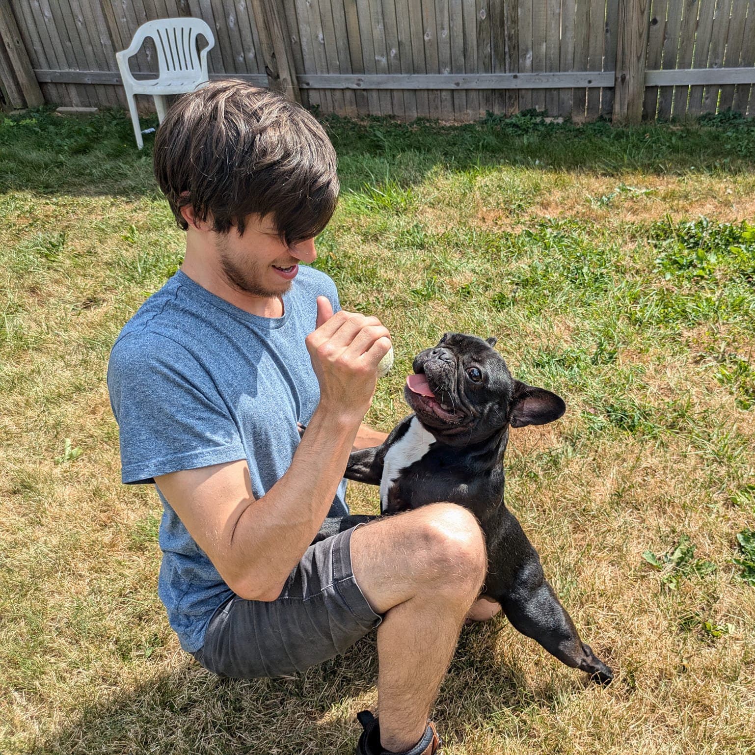 Brian with a cute black pug